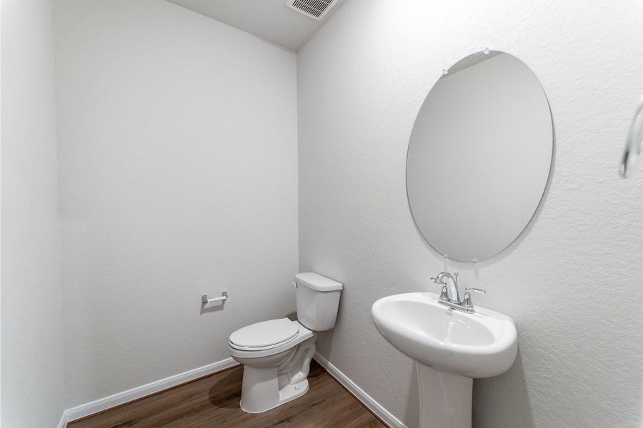 Furnished interior view inside a new home in The Woodlands at Medina Hills, Mico (Image 11).