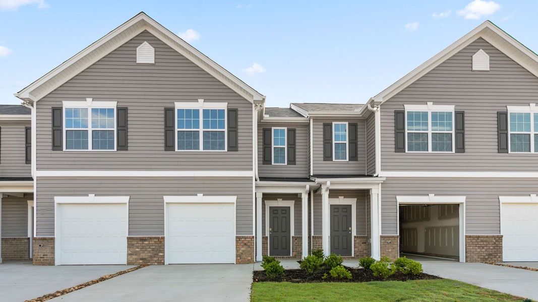 Front exterior of a new home in Henley Ridge, Graham, NC, highlighting curb appeal (Image 1).