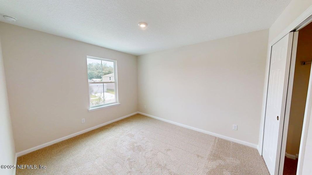 Spacious, unfurnished interior of a new home in Sandridge Hills, Green Cove Springs (Image 9).