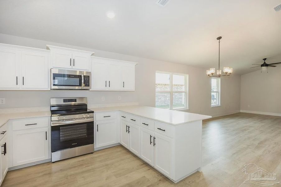 Furnished interior view inside a new home in Hidden Pines Estates, Milton (Image 6).