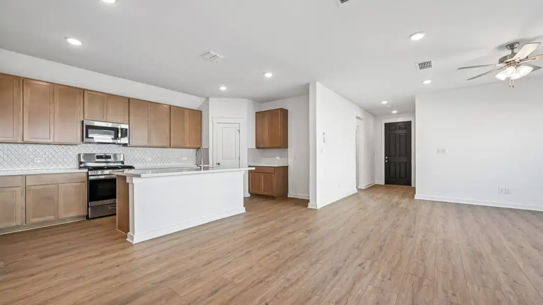 Furnished interior view inside a new home in Flora, Hutto (Image 14).