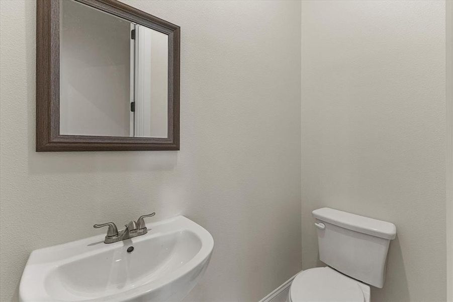 Bathroom with toilet and a sink