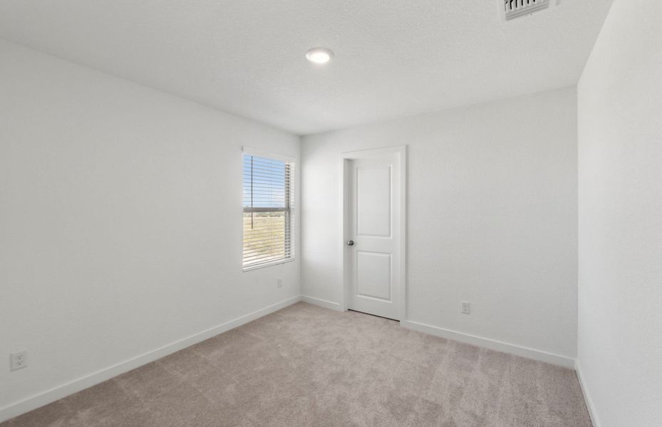 Spacious, unfurnished interior of a new home in Sonterra, Jarrell (Image 12).