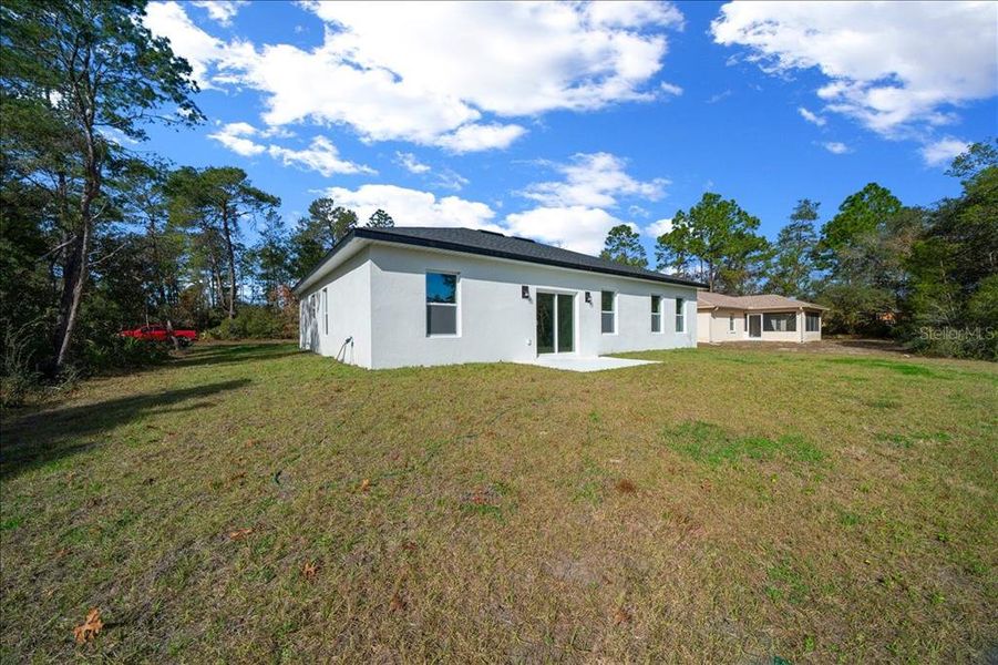 Exterior details and patio area of a home in , Ocala (Image 38).