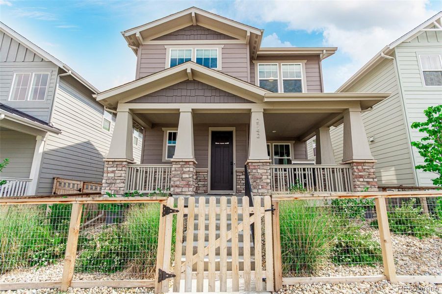 Front exterior of a new home in Arras Park, Thornton, CO, highlighting curb appeal (Image 20).