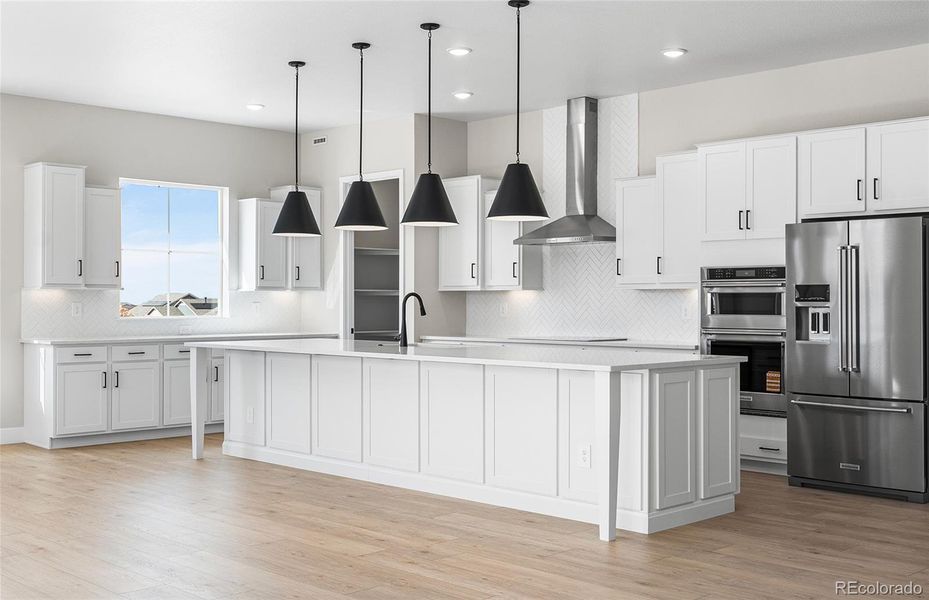 Furnished interior view inside a new home in Hilltop at Inspiration, Aurora (Image 20).