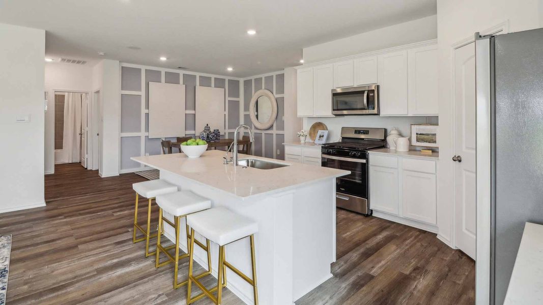 Furnished interior view inside a new home in Sunterra, Katy (Image 14).