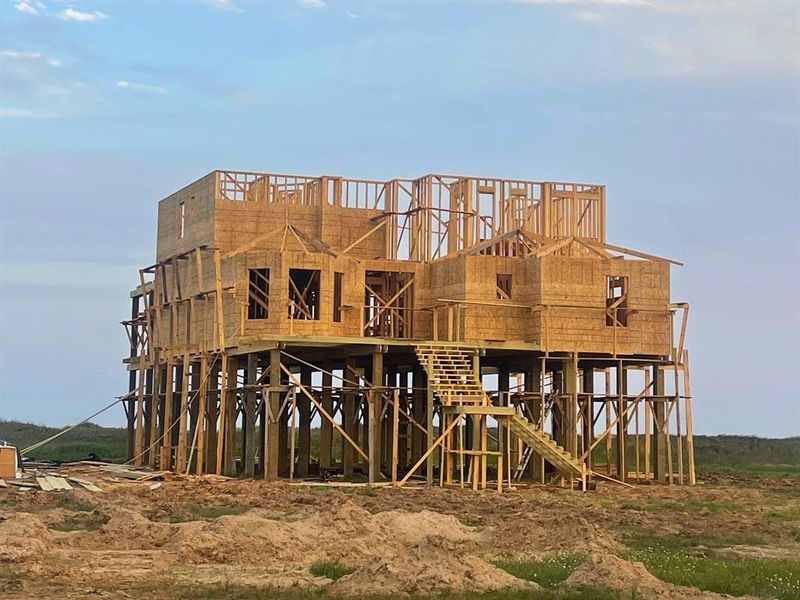 A look at the home’s impressive height and stilted foundation — built for elevation and peace of mind. A look at the home’s impressive height and stilted foundation — built for elevation and peace of mind.