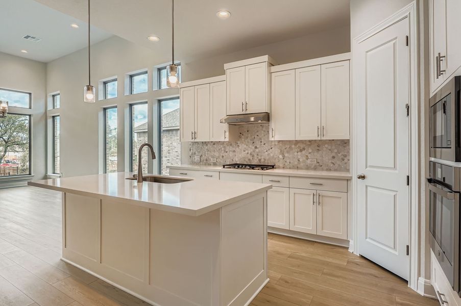 Furnished interior view inside a new home in 6 Creeks, Kyle (Image 4).