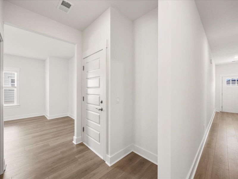 Spacious, unfurnished interior of a new home in The Coves at Lakes of Cane Bay, Summerville (Image 35). Spacious, unfurnished interior of a new home in The Coves at Lakes of Cane Bay, Summerville (Image 35).