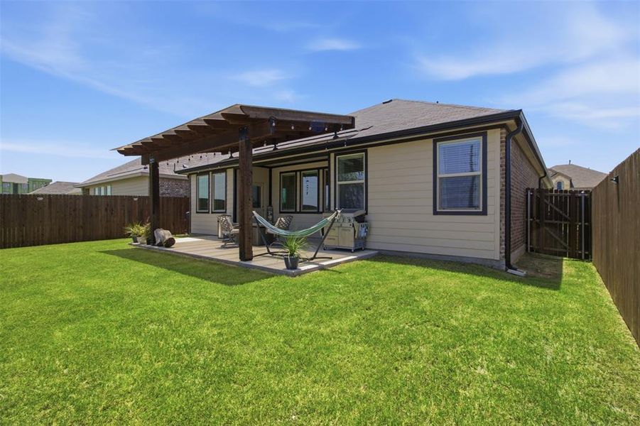 Exterior details and patio area of a home in Kings Ridge, Denton (Image 24). Exterior details and patio area of a home in Kings Ridge, Denton (Image 24).