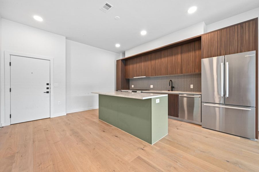 Furnished interior view inside a new home in One Oak, Austin (Image 18).