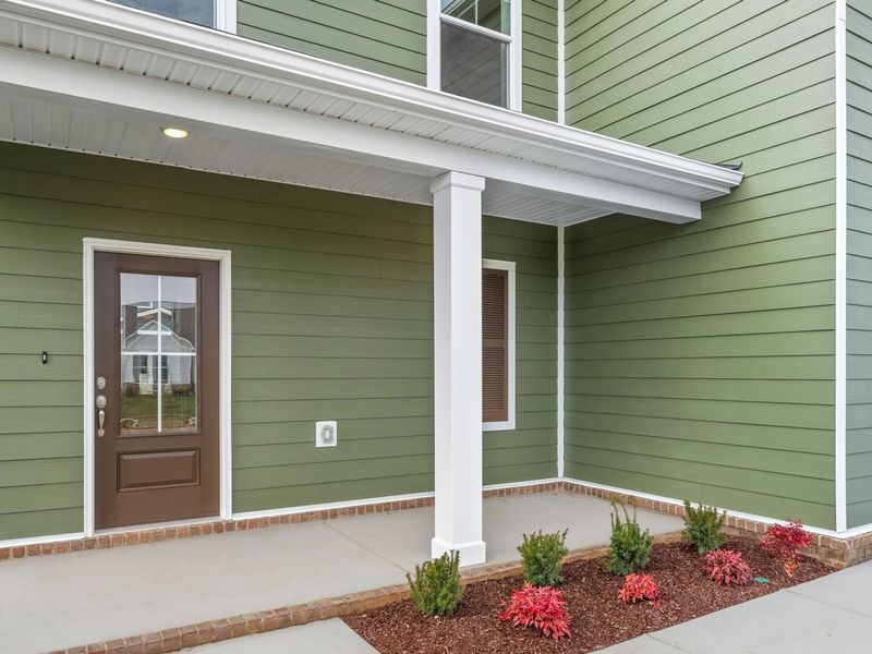 Exterior details and patio area of a home in Sage Farms, White House (Image 3).