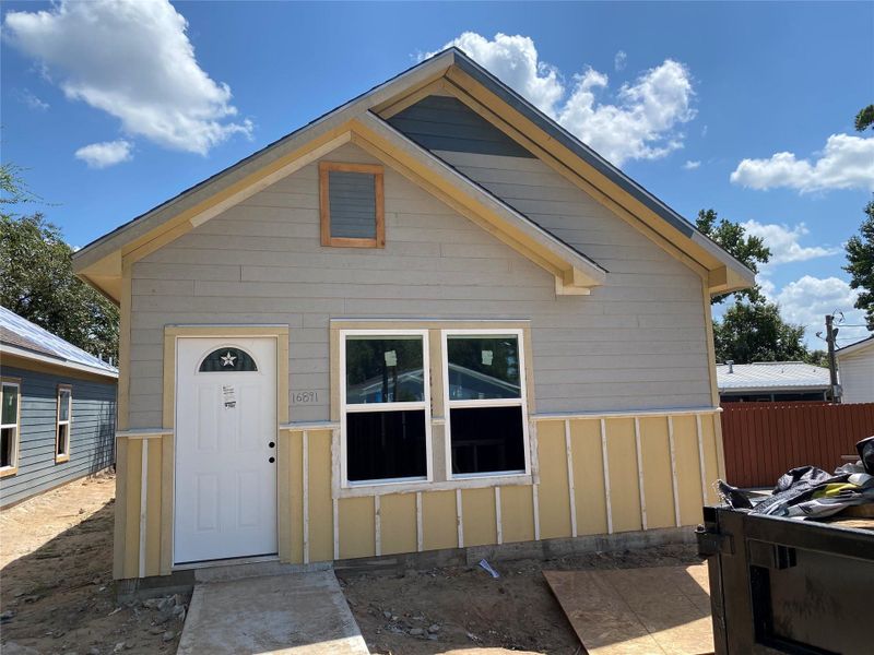 Front exterior of a new home in , Montgomery, TX, highlighting curb appeal (Image 2). Front exterior of a new home in , Montgomery, TX, highlighting curb appeal (Image 2).