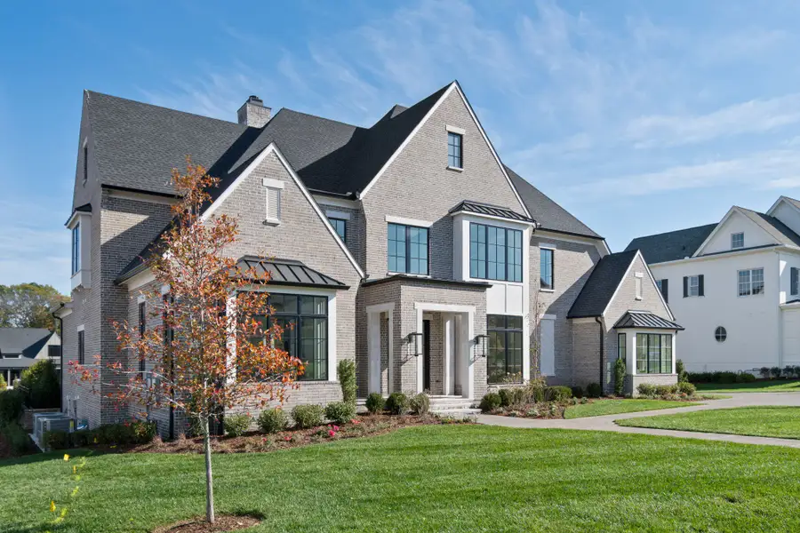 Front exterior of a new home in Rosebrooke, Brentwood, TN, highlighting curb appeal (Image 2).