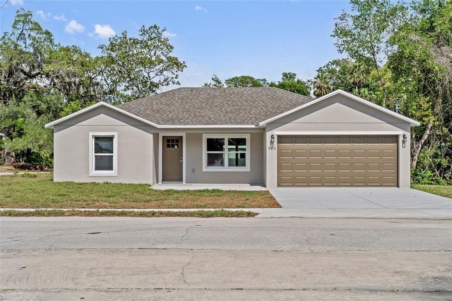 Front exterior of a new home in , Orange City, FL, highlighting curb appeal (Image 28).