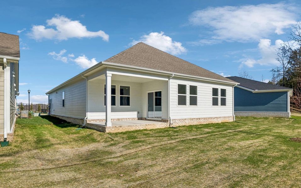 Exterior details and patio area of a home in Cedars of Cane Ridge | 55+ Community, Antioch (Image 21).