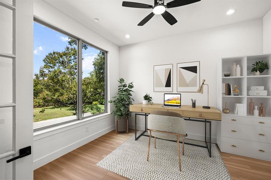 Virtually staged office with gorgeous windows looking out front.