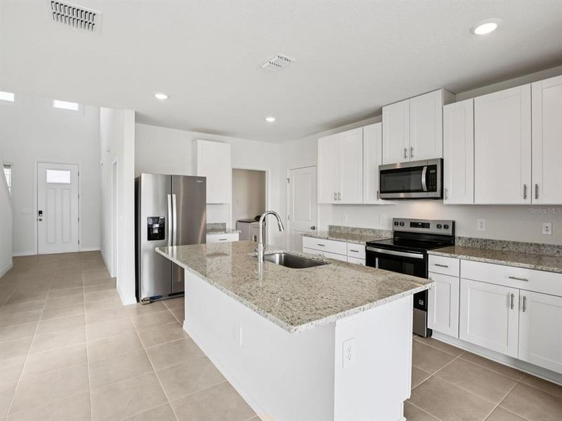 Furnished interior view inside a new home in Oakfield Trails - Premier Series, Parrish (Image 3).