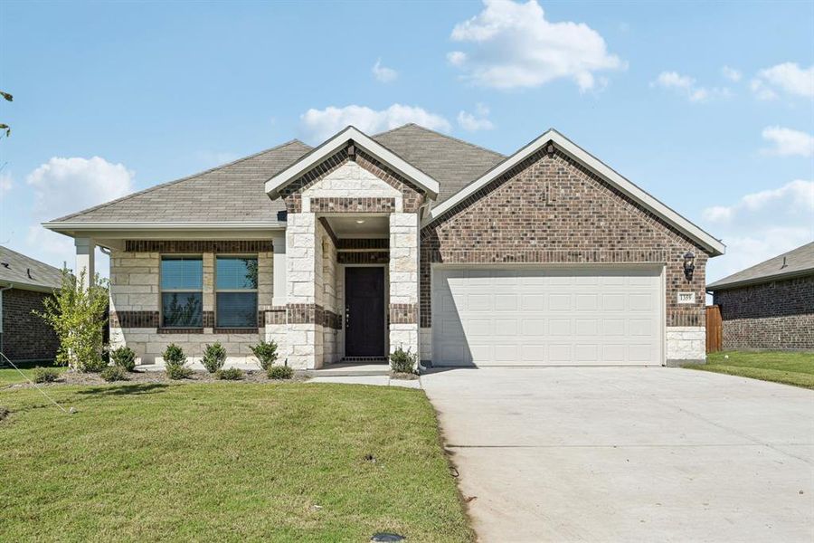 Front exterior of a new home in River Ridge, Crandall, TX, highlighting curb appeal (Image 1). Front exterior of a new home in River Ridge, Crandall, TX, highlighting curb appeal (Image 1).