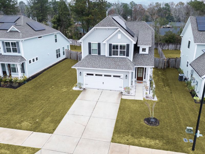 Front exterior of a new home in Abbey Walk, Moncks Corner, SC, highlighting curb appeal (Image 23). Front exterior of a new home in Abbey Walk, Moncks Corner, SC, highlighting curb appeal (Image 23).