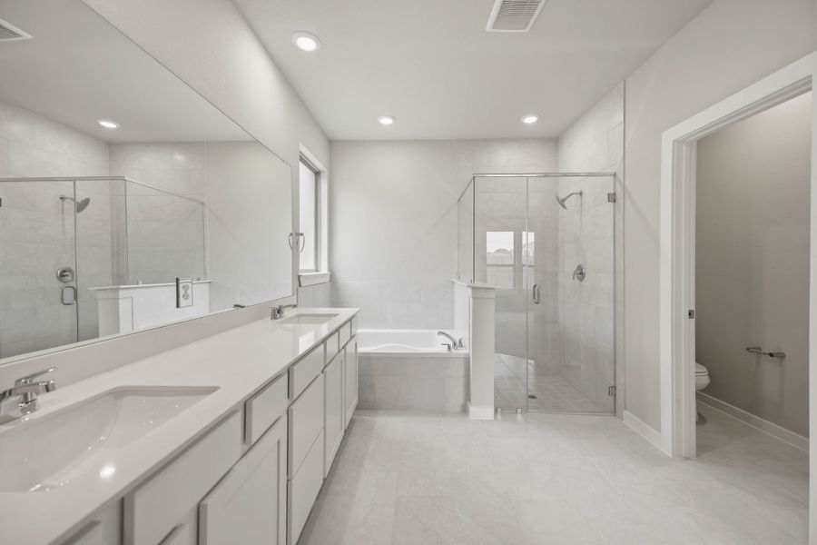Furnished interior view inside a new home in Sunterra 40, Katy (Image 12).