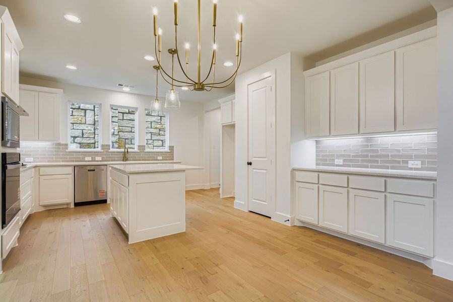 Furnished interior view inside a new home in Castle Hills Northpointe - Townhomes, Lewisville (Image 8).