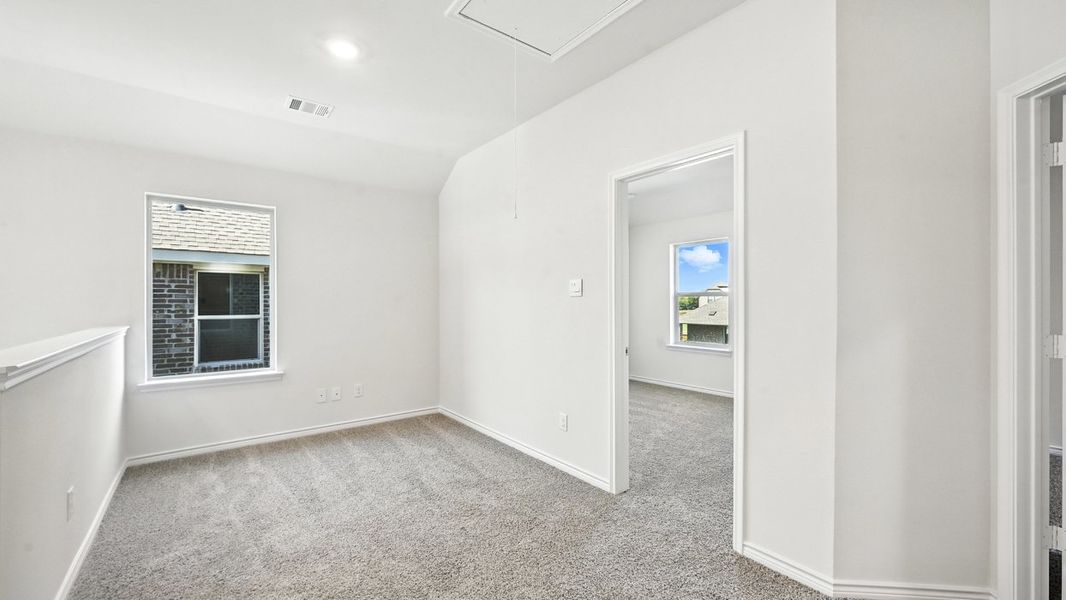 Representative unfurnished interior of a home built from the Aquamarine by D.R. Horton in The Woods at Lindsey Place, Anna (Image 11).