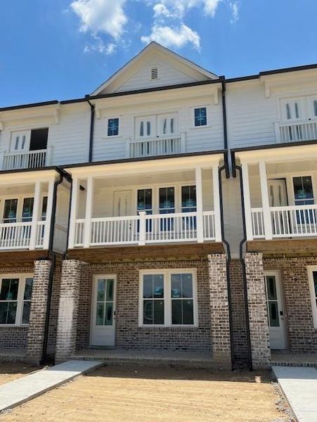 Front exterior of a new home in The Village at River Green, Canton, GA, highlighting curb appeal (Image 4).