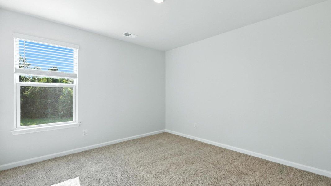 Spacious, unfurnished interior of a new home in The Ranch, Holly Hill (Image 15).