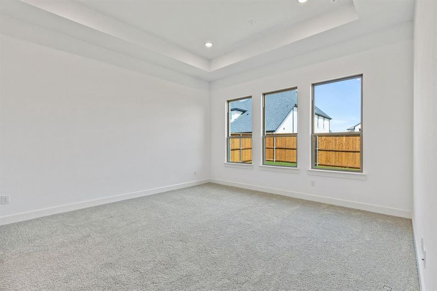 Located at the rear of the home for additional privacy, this owner's suite was designed for rest and relaxation.