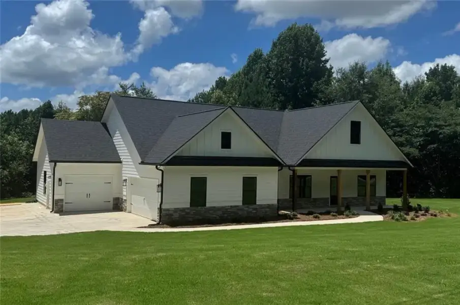 Front exterior of a new home in , Bremen, GA, highlighting curb appeal (Image 6). Front exterior of a new home in , Bremen, GA, highlighting curb appeal (Image 6).