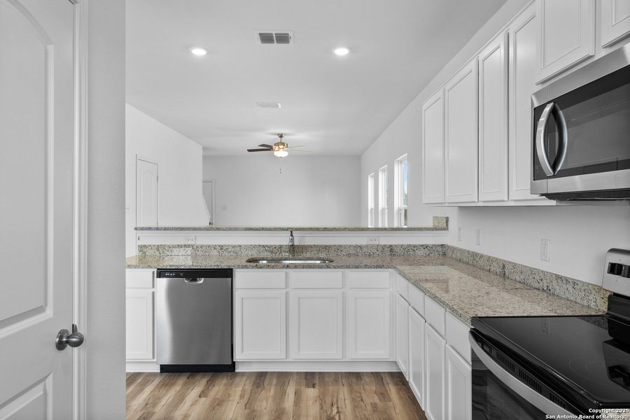 Furnished interior view inside a new home in Blue Wing, San Antonio (Image 7). Furnished interior view inside a new home in Blue Wing, San Antonio (Image 7).