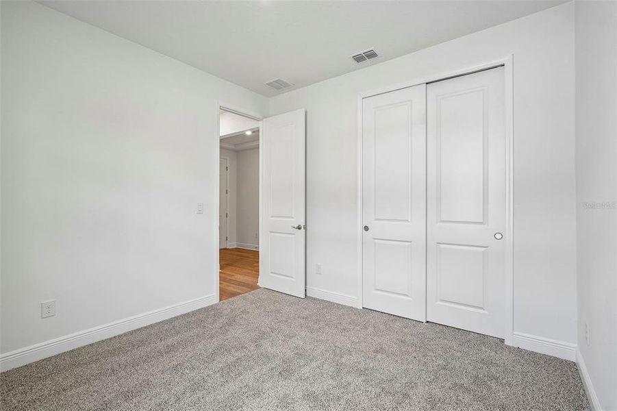 Spacious, unfurnished interior of a new home in Legends Preserve - Signature Series, Daytona Beach (Image 24).