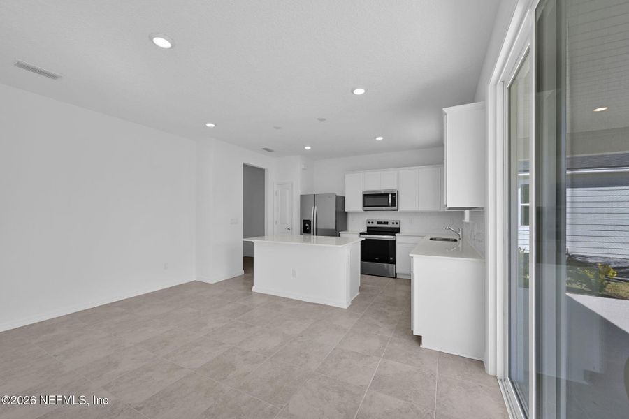 Furnished interior view inside a new home in Hyland Trail, Green Cove Springs (Image 8).