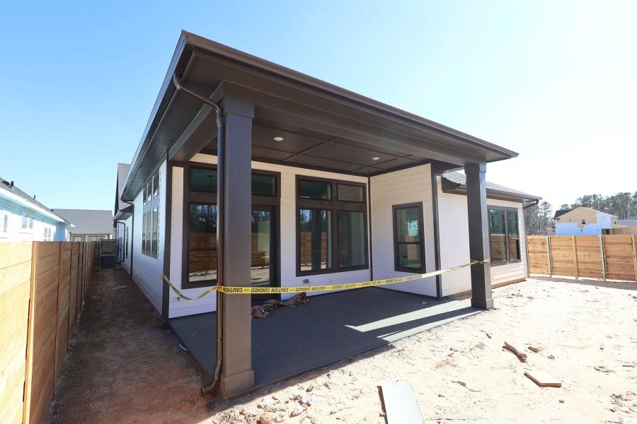 Exterior details and patio area of a home in Two Step Farm 50', Montgomery (Image 2).