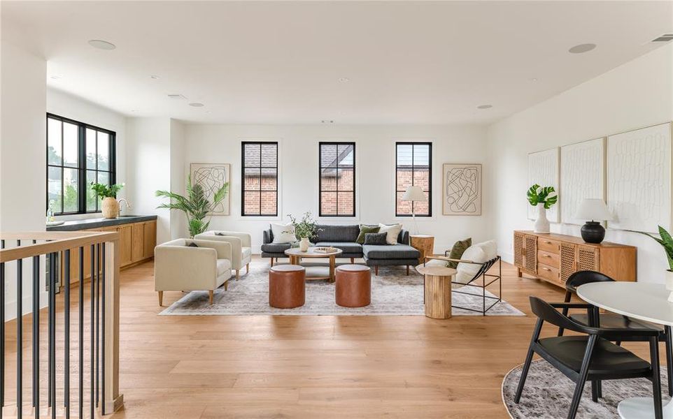 Living area with light wood-style flooring
