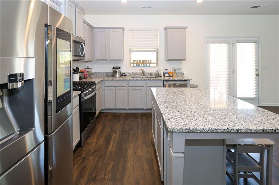 Furnished interior view inside a new home in The Enclave at Flat Rock Hills, Stonecrest (Image 7).