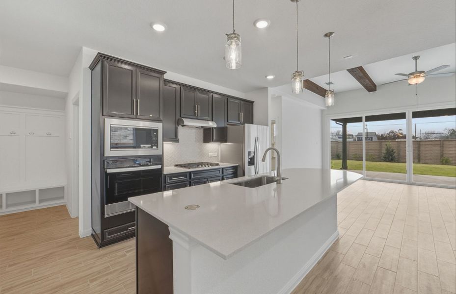 Furnished interior view inside a new home in Wolf Ranch, Georgetown (Image 8).