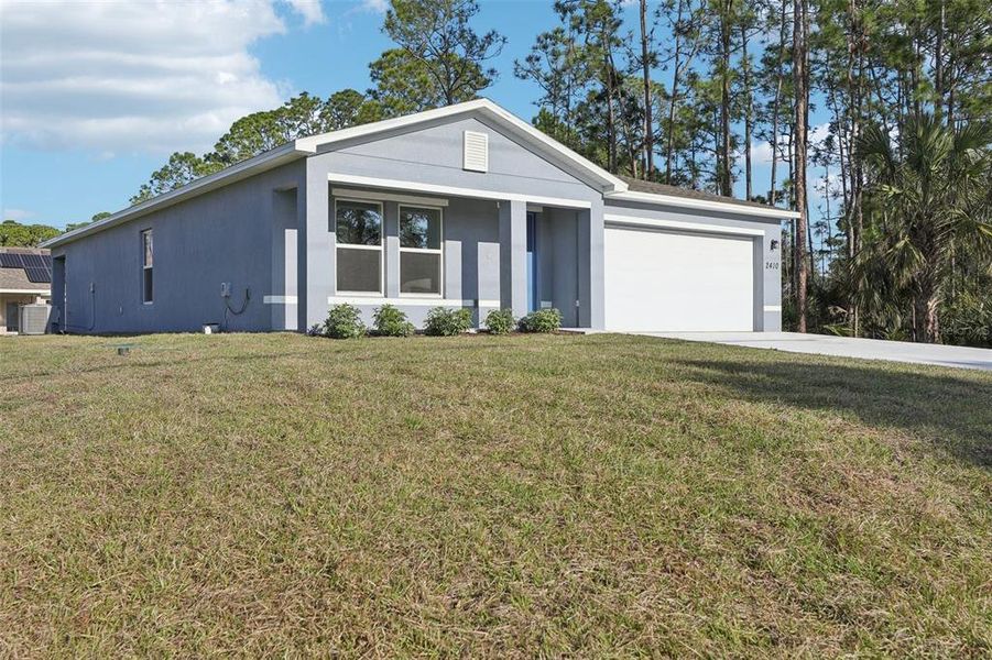 Front exterior of a new home in Sun 'N Lake, Sebring, FL, highlighting curb appeal (Image 27). Front exterior of a new home in Sun 'N Lake, Sebring, FL, highlighting curb appeal (Image 27).