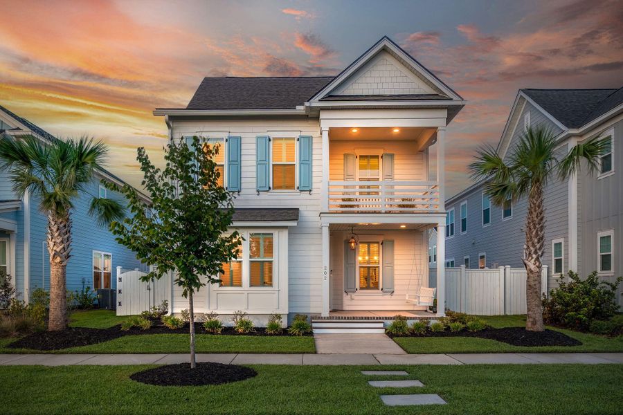 Front exterior of a new home in Nexton, Summerville, SC, highlighting curb appeal (Image 22). Front exterior of a new home in Nexton, Summerville, SC, highlighting curb appeal (Image 22).