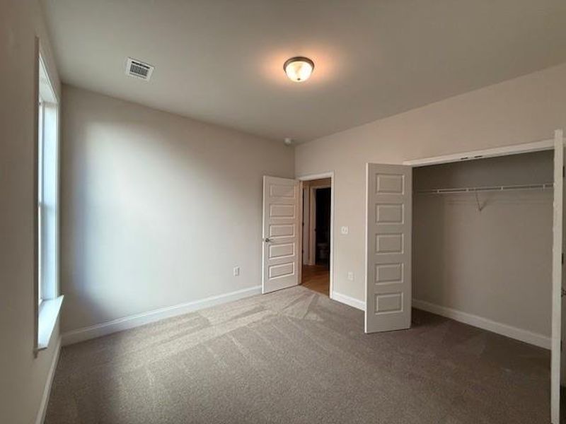 Spacious, unfurnished interior of a new home in Cooper's Walk, Loganville (Image 25).