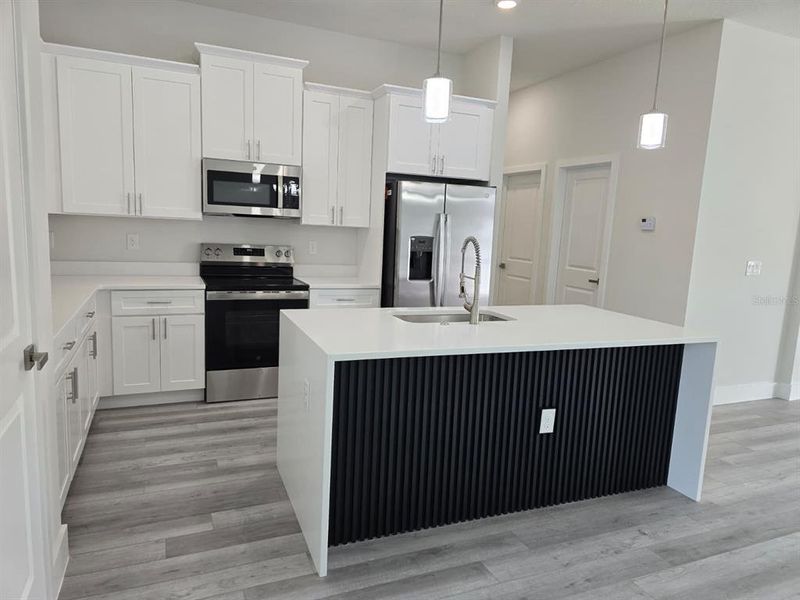 Furnished interior view inside a new home in , Port Charlotte (Image 9). Furnished interior view inside a new home in , Port Charlotte (Image 9).