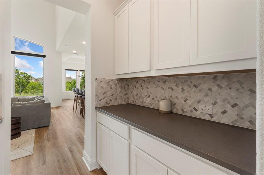 Dry bar between kitchen and living room Dry bar between kitchen and living room