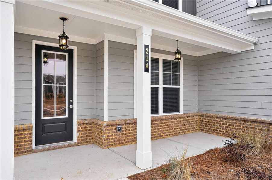 Exterior details and patio area of a home in The Fairways at Mirror Lake, Villa Rica (Image 4).