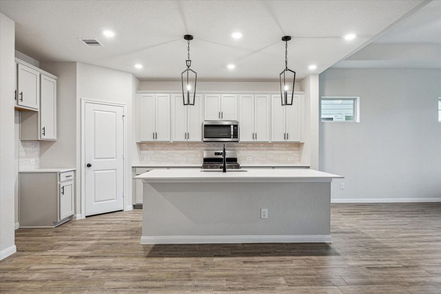 Furnished interior view inside a new home in Elyson, Katy (Image 17).
