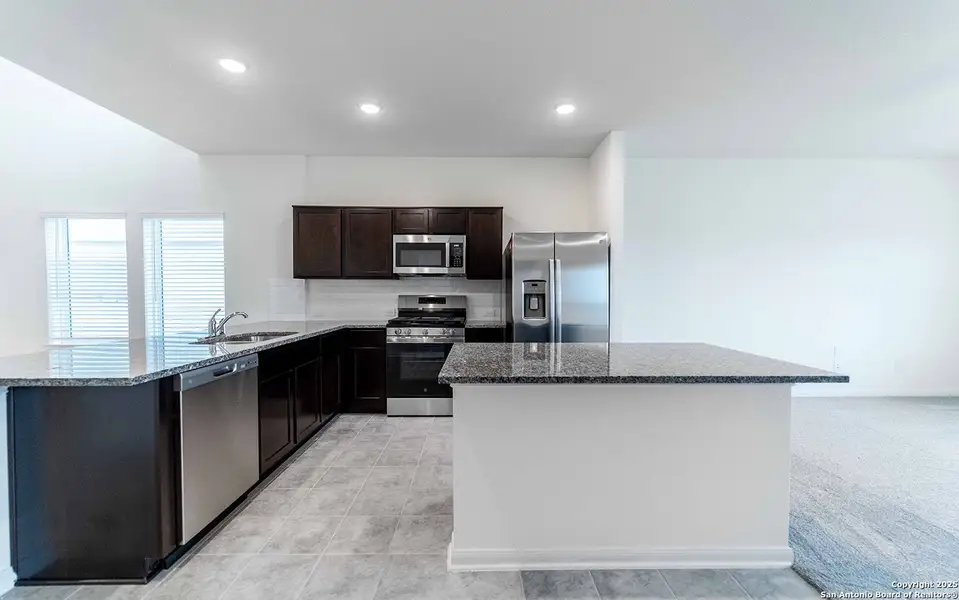 Furnished interior view inside a new home in Hunter's Ranch, San Antonio (Image 2).