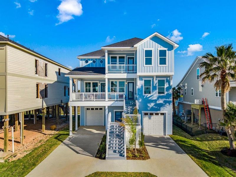 Front exterior of a new home in , Galveston, TX, highlighting curb appeal (Image 27). Front exterior of a new home in , Galveston, TX, highlighting curb appeal (Image 27).