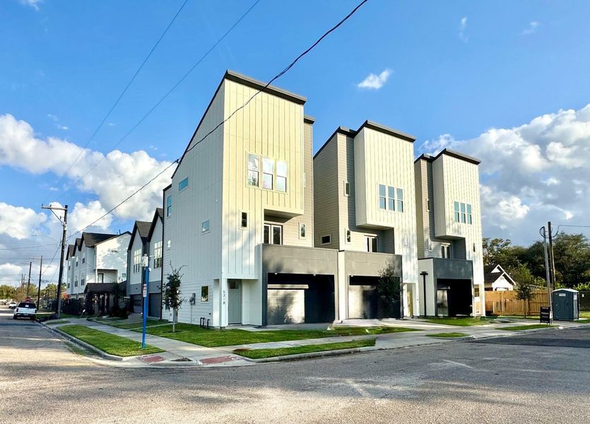 Modern exterior with balcony and private driveways