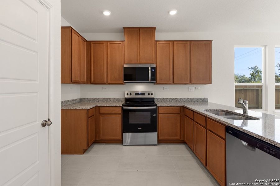 Furnished interior view inside a new home in Spanish Trails Villas, San Antonio (Image 5).